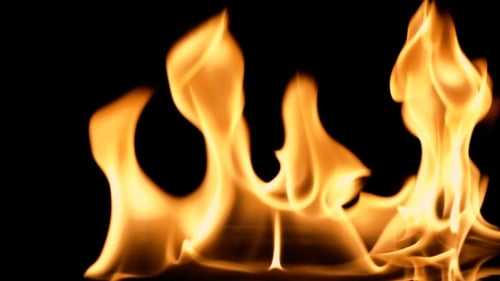 Dynamic Orange Flames on Black Background
