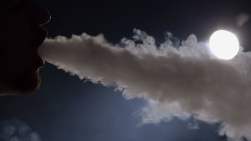 Exhale smoke.