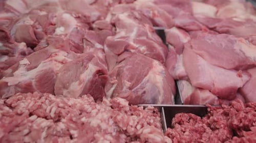 Pieces of Fresh Raw Meat in a Shop Window