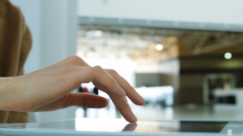 Woman Uses Tablet Pc Computer in Business Center