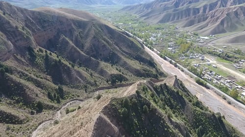 Aerial View of Mountains and Rural Village