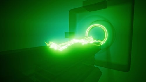 Glowing Skeleton Scanned by Futuristic MRI Machine