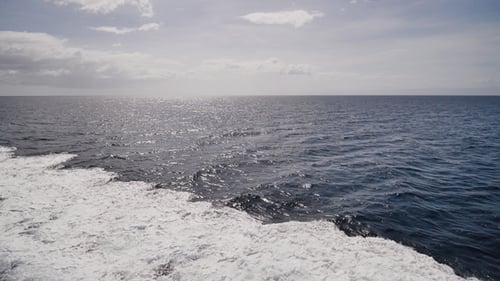 Background of Water Trail Foaming Behind a Ferry Boat