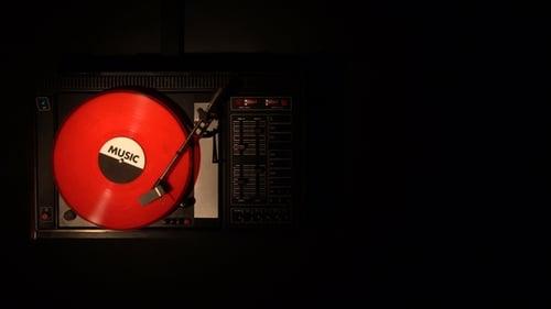 Old Turntable Plays Song from a Vinyl Record
