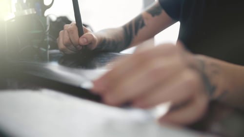 Artist Draws on Tablet Close Up Shot