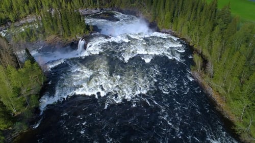 Aerial View of Waterfall in Lush Forest