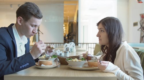 Man and Woman Having Lunch at a Cafe