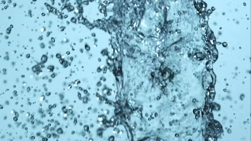 Abstract Water Droplets Splashing on Blue Background