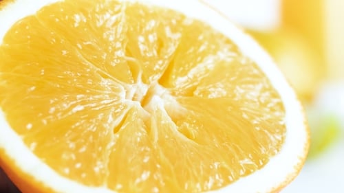 Vibrant Orange Fruit Half in Close Up
