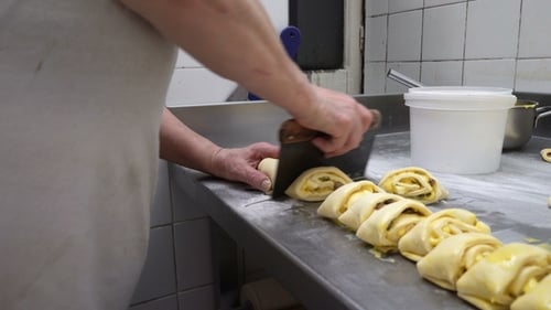 Traditional Italian Bakery. Two Female Bakers Prepare Sweet Buns with Cream Pasticcera, Raisins
