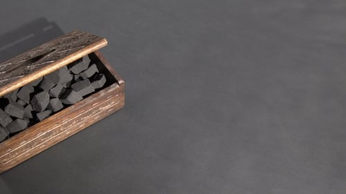 Charcoal Briquettes in Carved Wood Box