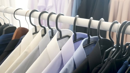 Hanger with Male Business Clothes in a Store