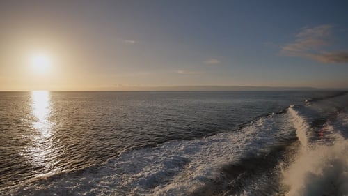 Background of Water Trail Foaming Behind a Ferry Boat