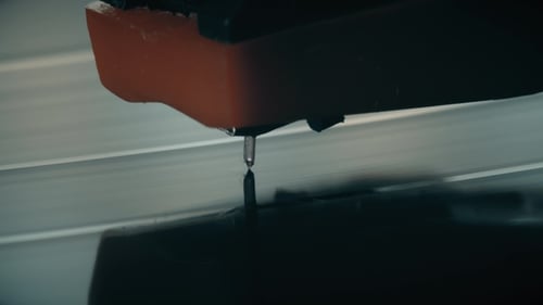 Record Player Needle on Vinyl Record Close Up