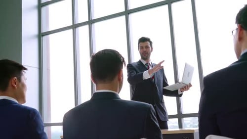 Business Presentation with Laptop in Modern Office