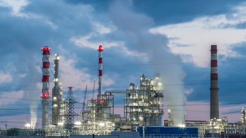 Industrial Pipelines of an Oil-Refinery Plant at Twilight