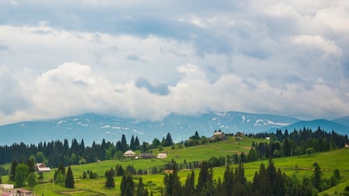 of Blue Sky with Clouds Over Mountain