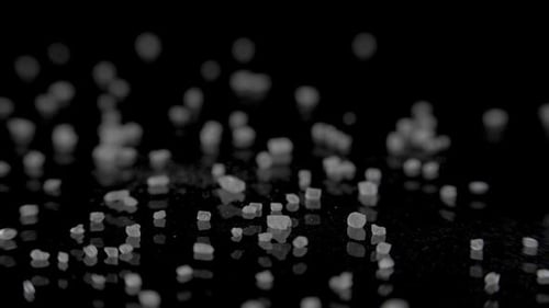 Sugar Falling on the Table in Dark Studio. , 180 Fps Shot