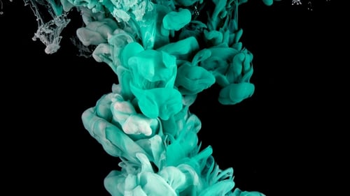 Turquoise Ink in Water Shooting with High Speed Camera. White Paint Dropped, Reacting, Creating