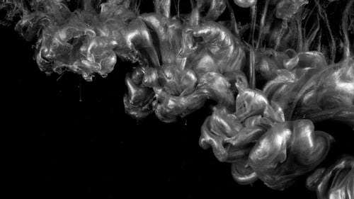 Metallic Silver Liquid Swirls Against Black Backdrop