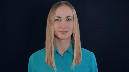 Blonde Woman Smiling and Waving on Black Background