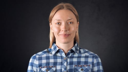 Smiling Blond Woman Close Up Portrait on Black