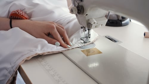 Sewing Machine Stitching White Fabric Close Up