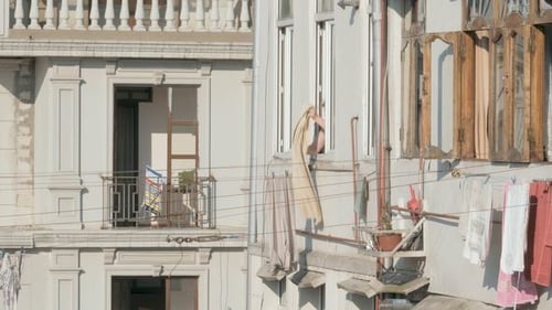 Woman Removes Clothes From Rope, Georgia
