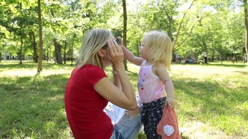 Woman and Child Playing in the Park