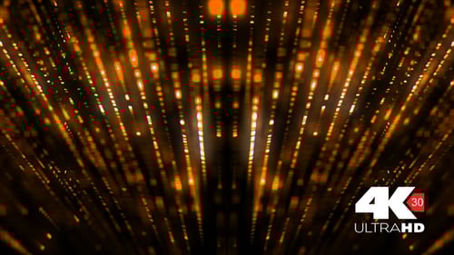 Golden Glittering Particles Falling Down Abstract Background