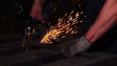 Sparks flying off Metal as it is Being Ground