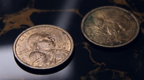 Close Up of Tarnished Copper Colored Coin
