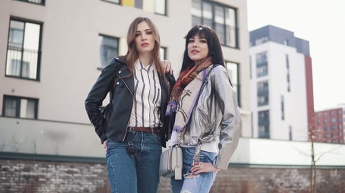 Portrait of Two Young Fashionable Girls in the Spring City