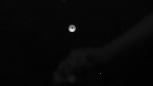 Single Water Drop Creates Expanding Ripples