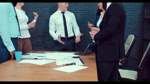 Diverse Team Collaborates During a Corporate Meeting