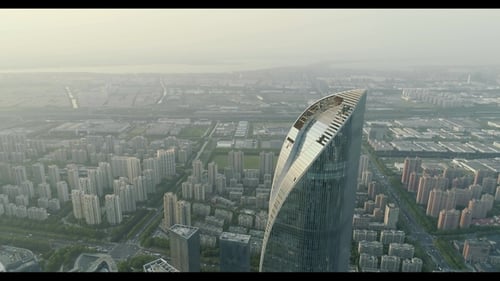 Drone Flight Over Top of Skyscraper Under Construction