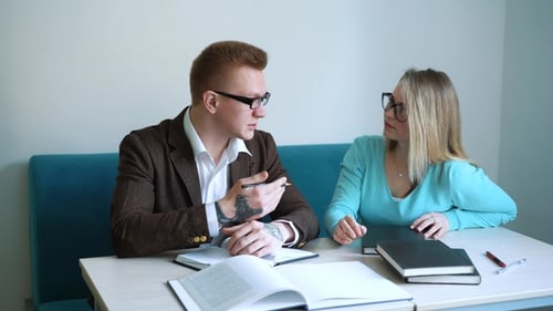 Positive Male and Female Students Doing Homework Together Spending Time in Campus,colleagues Making