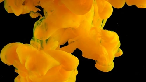 Vibrant Yellow Ink Cloud Abstract Background