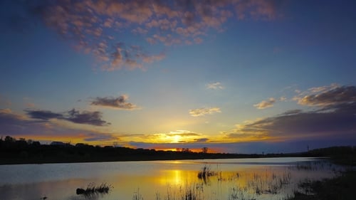 Landscape with Sunset over Lake
