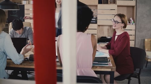 Creative Team Meeting in Modern Office