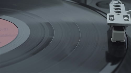 Spinning Black Vinyl Record on a Turntable