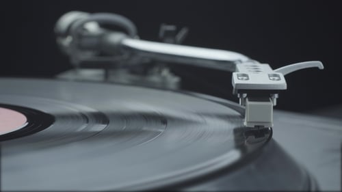 Vinyl Record Spinning on Turntable Close Up