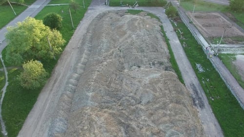 Aerial Shot of School Football Stadium Preparing for Construction New Stadium.