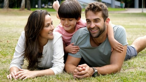 Smiling Family in Park