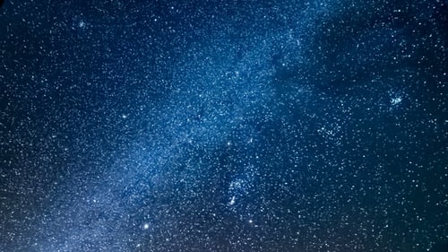 Geminid Meteor Shower of Night Sky with Milky Way