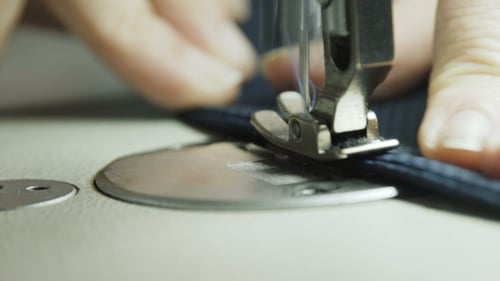 Slowly Process of Stitching a Jacket with Sewing Machine