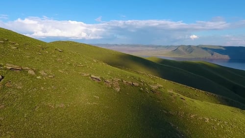 Aerial View of the Green Hills, Cloudy Sky and the Yenisei River in the Republic of Khakassia