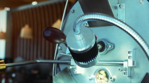 Coffee Beans Spinning in Roasting Machine