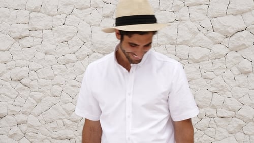 Stylish Man in White Shirt Posing Outdoors