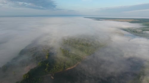 Flight above Dense Fog at Dawn